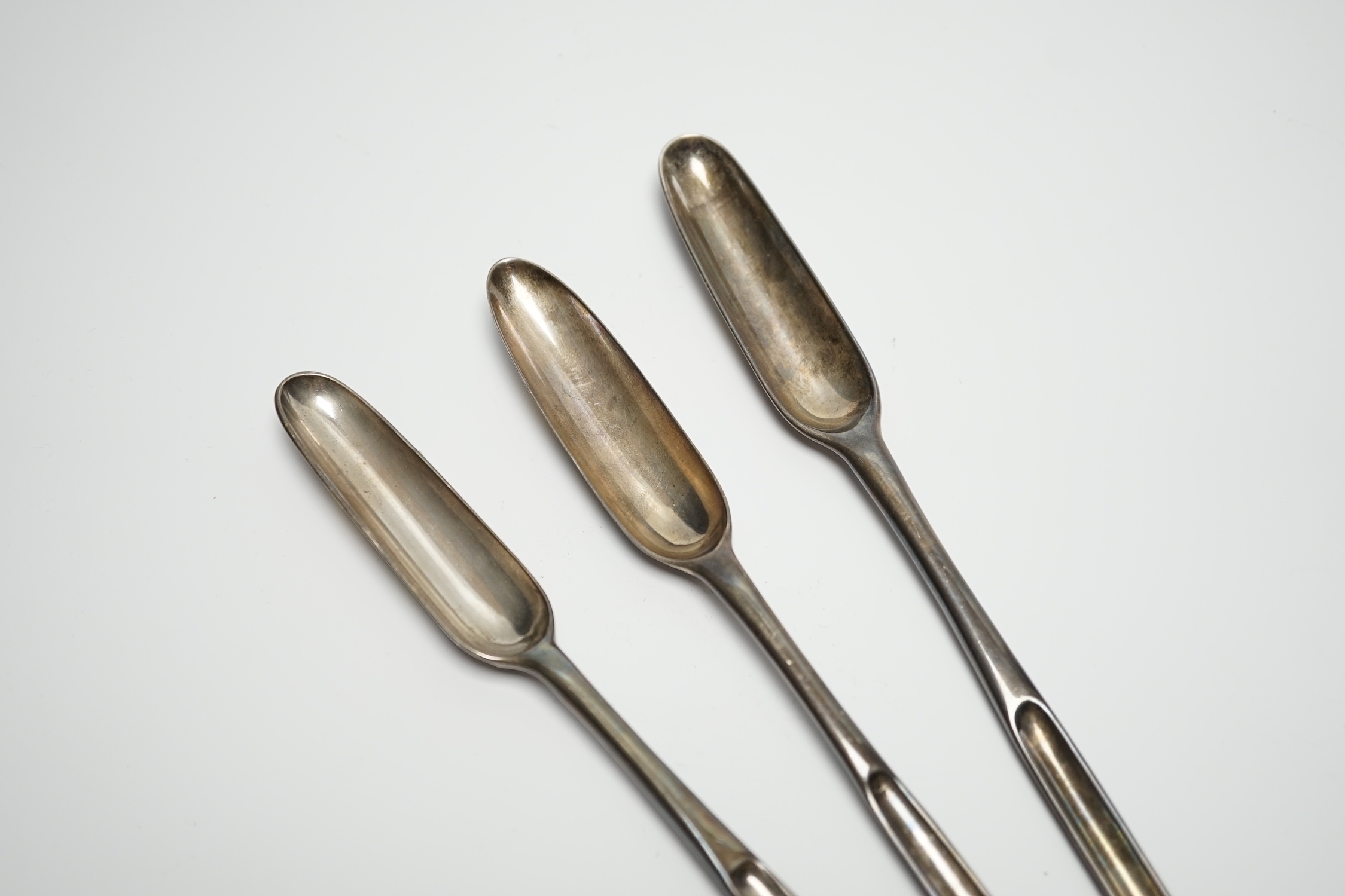 Three George II silver marrow scoops, Richard Pargeter, London, 1733, 20.7cm, Ann Hill, London, 1734 and Ebeneezer Coker?, London, 1755.
